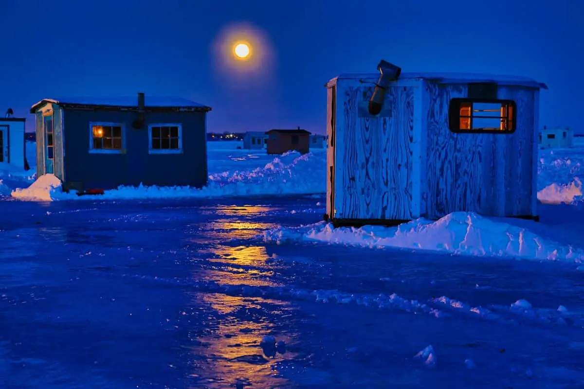 Photo of Full Moon Ice Fishing Shacks