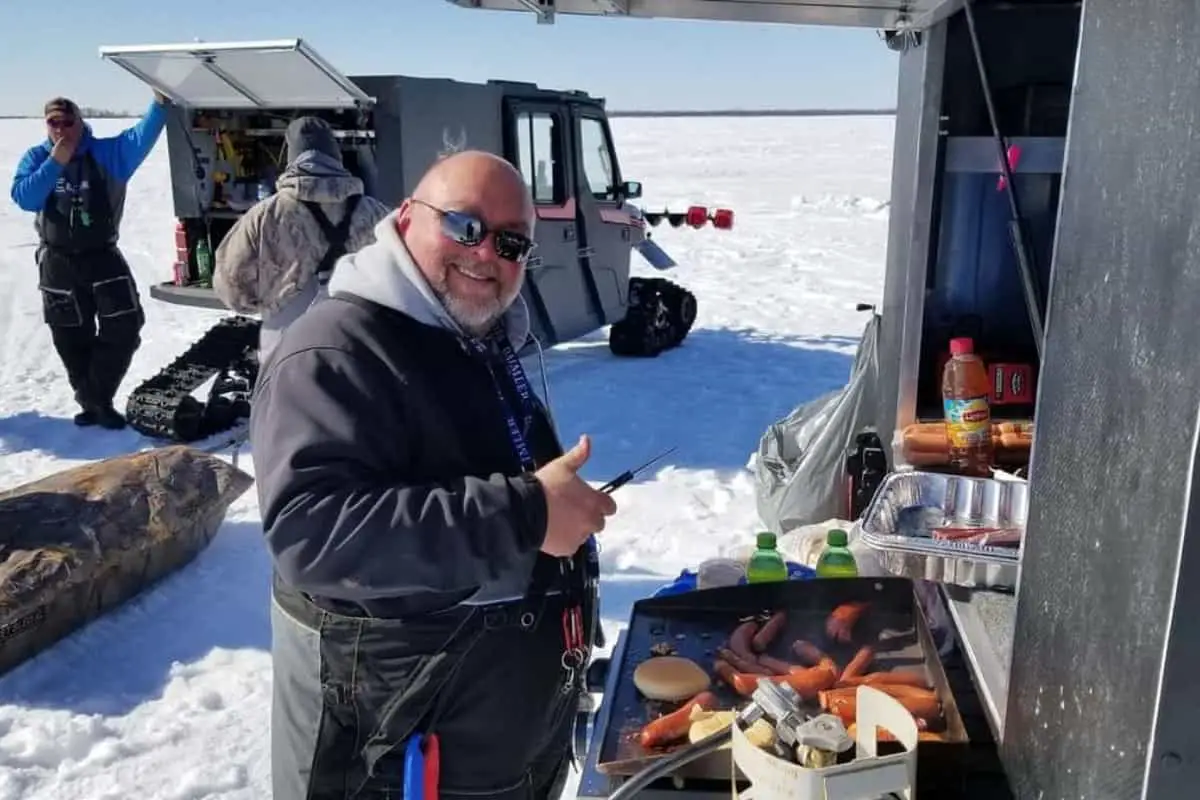 Photo of Man Cooking on Ice